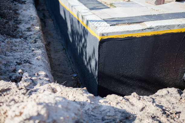 Professional Interior Drainage System technician working in Wheeler, IN